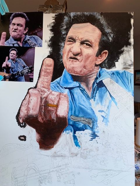 A painting of johnny cash is being painted