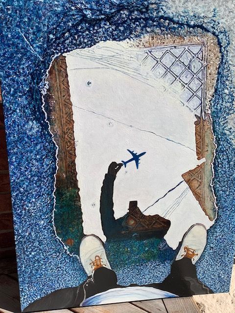 A painting of a person standing in front of a plane