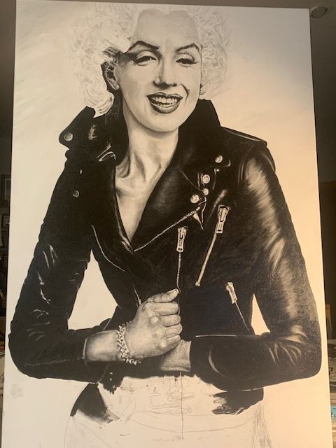 A black and white drawing of marilyn monroe wearing a leather jacket