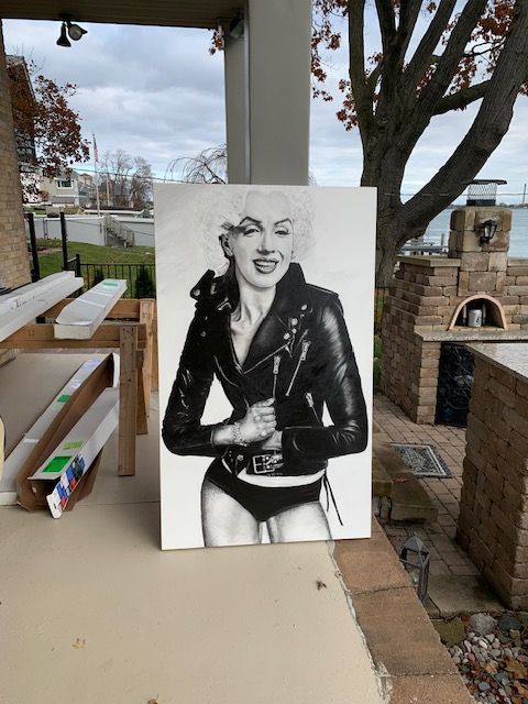A black and white painting of marilyn monroe in a leather jacket