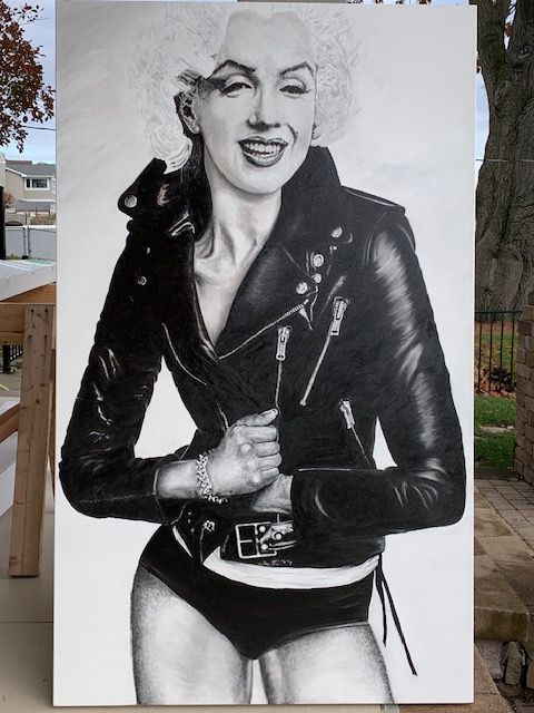 A black and white drawing of marilyn monroe wearing a leather jacket