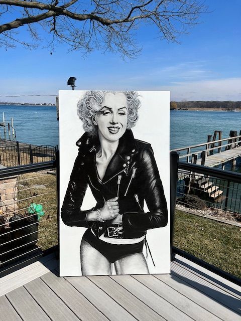 A painting of marilyn monroe in a leather jacket