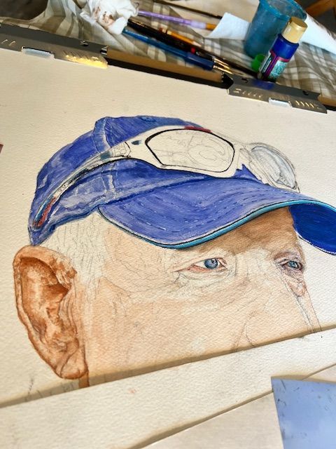 A painting of a man wearing a blue hat and goggles
