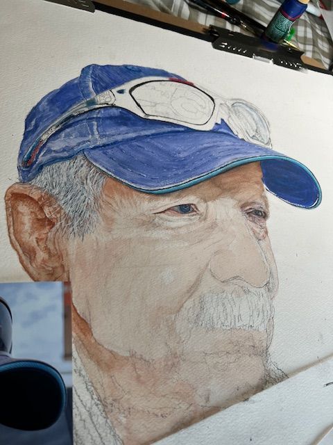 A drawing of a man wearing a blue hat and sunglasses