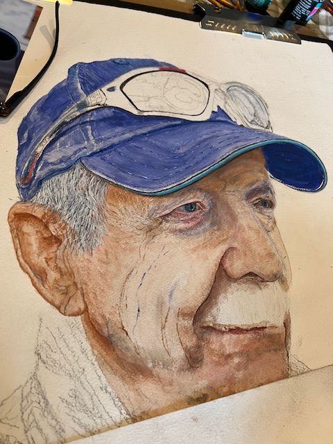 A drawing of a man wearing a blue hat and sunglasses