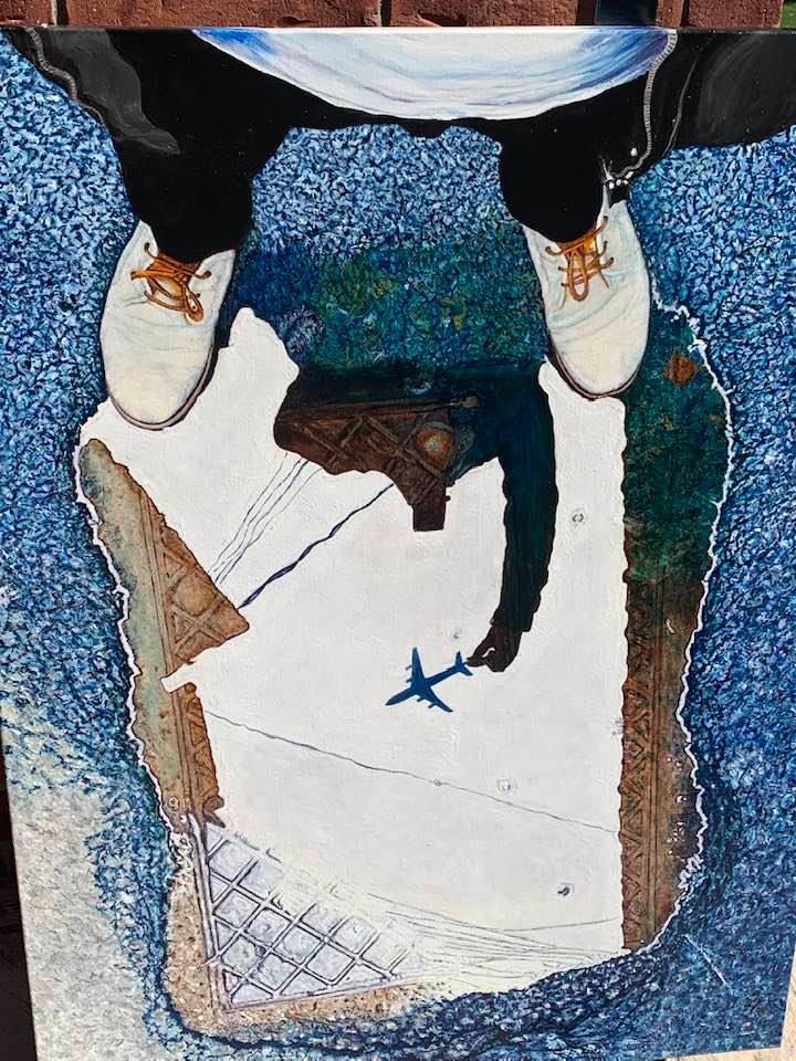 A painting of a person standing in a puddle with a plane reflected in it