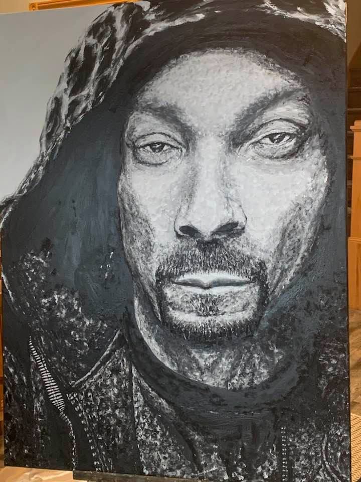 A black and white painting of snoop dogg