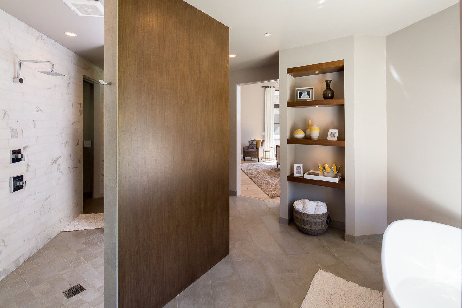 A bathroom with a walk in shower and a bathtub