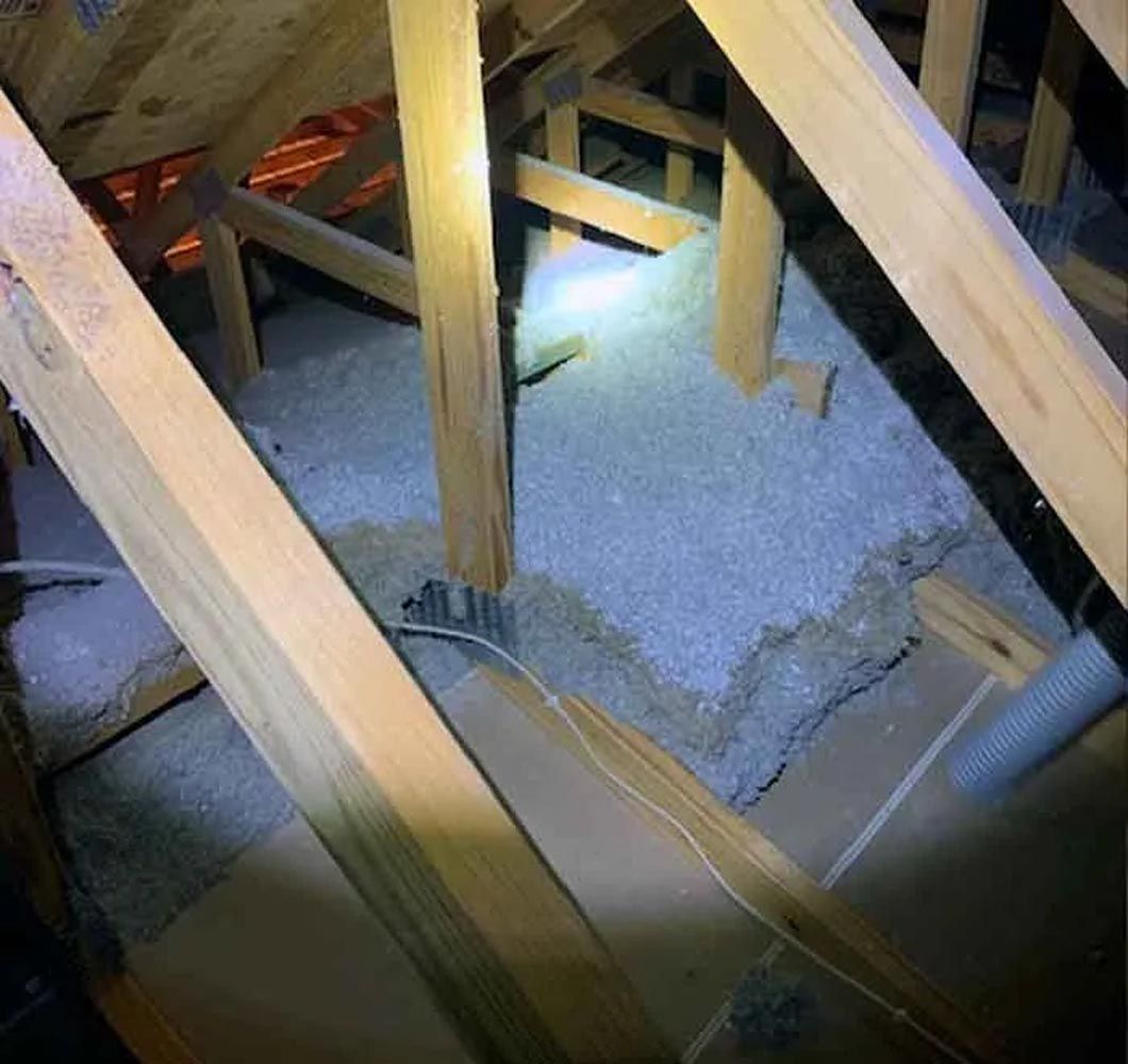 A wooden structure with a light shining through it.