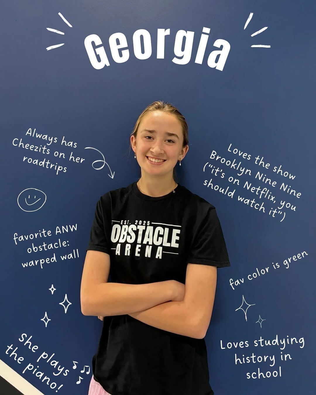 A young person named Georgia with crossed arms, smiling in front of a blue wall with text about her interests.