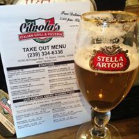 Citrola's Italian menu next to a Stella Artois beer.