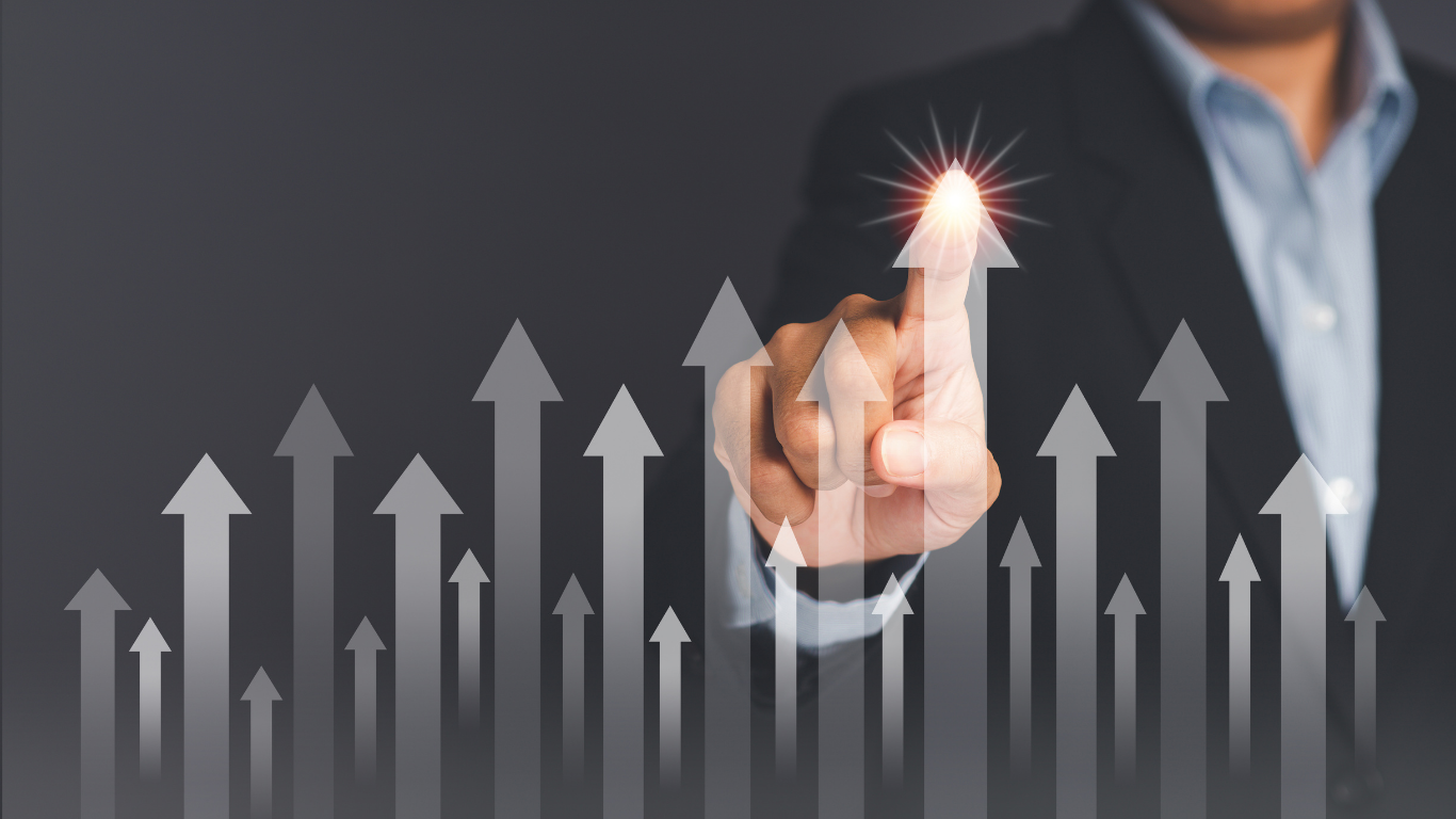 Person in suit pointing finger up at glowing arrow among many upward-pointing arrows.