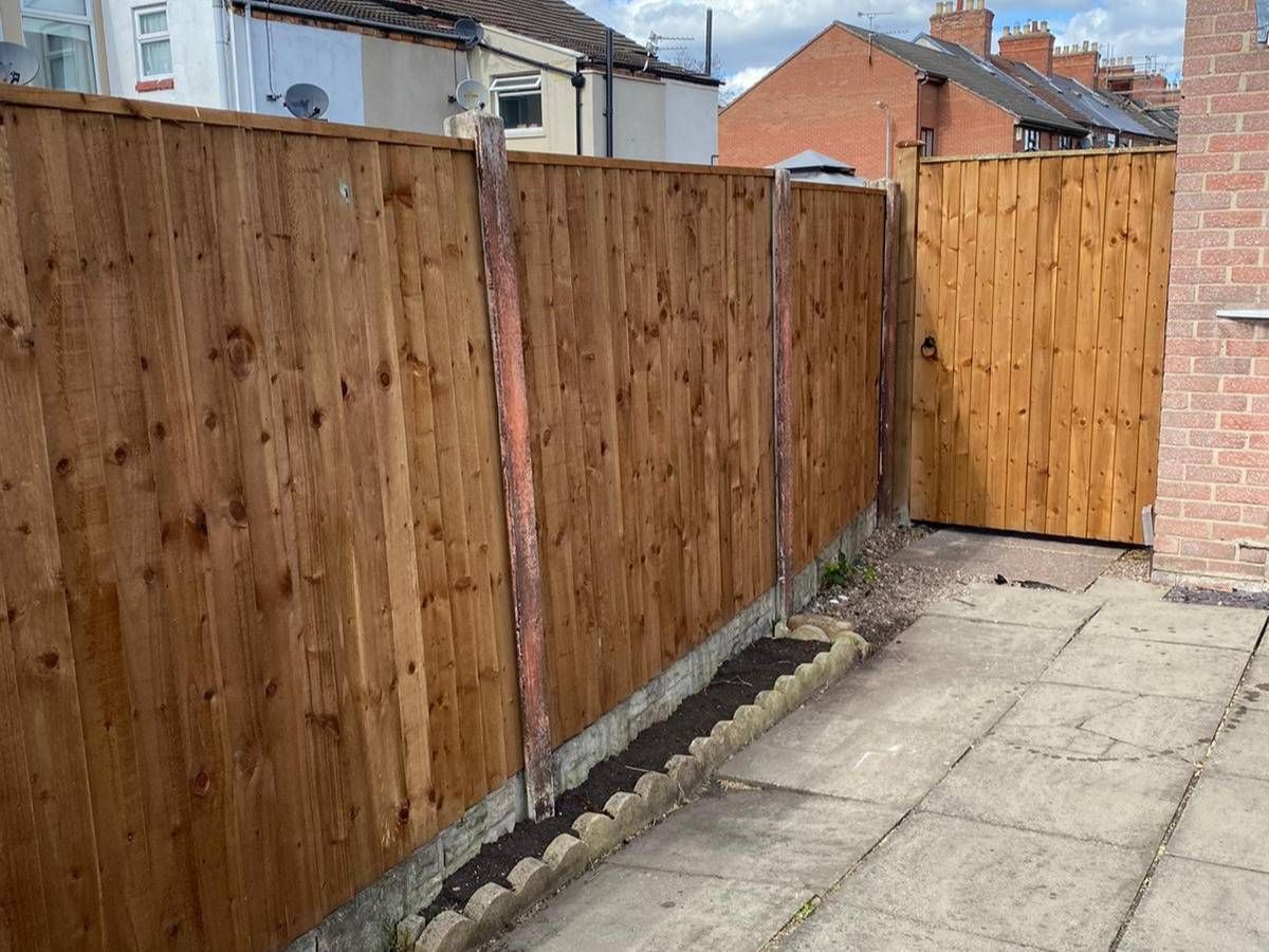Nottingham Fencing replaced old wooden panels in a fence in Netherfield