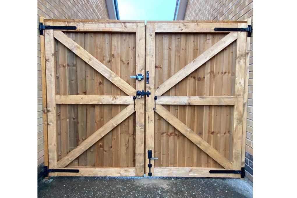 Wooden Driveway Gates with a number of locks