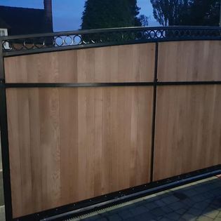 Nottingham Fencing sliding metal framed wooden driveway gates