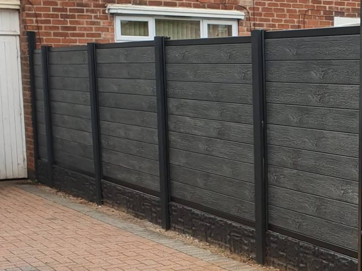 Nottingham Fencing painted concrete gravel boards and posts with new composite fencing in existing concrete posts