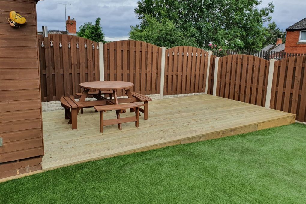 garden decking installed and furniture in place
