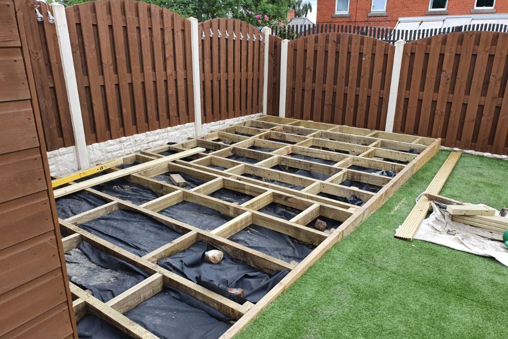 Decking frame being installed in a garden in West bridgford