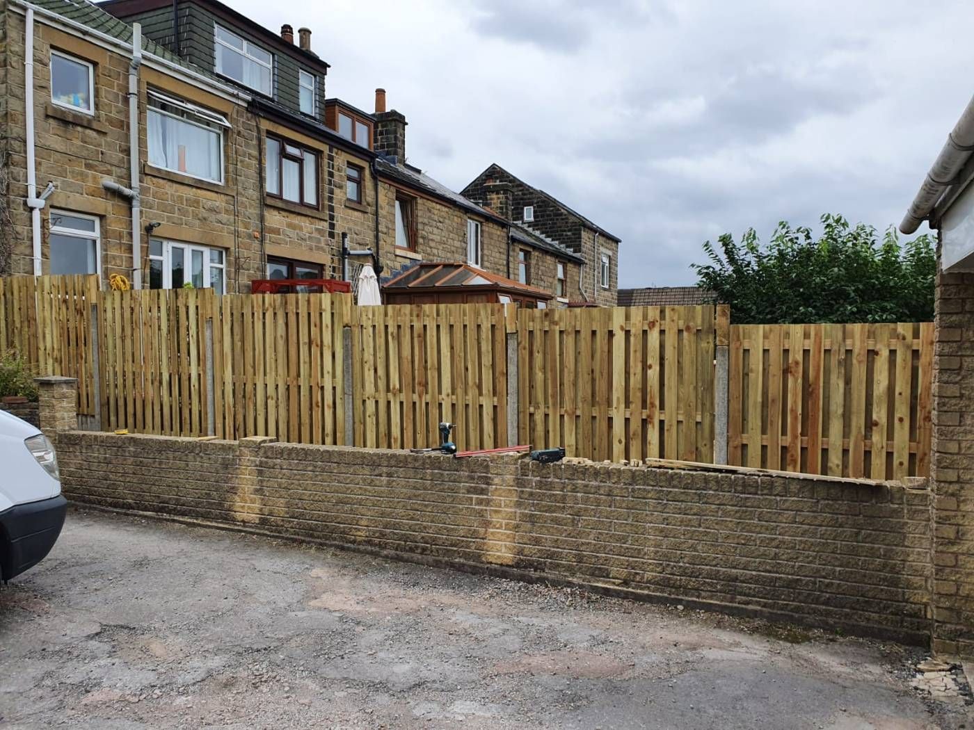 garden fencing in Arnold alongside a wall