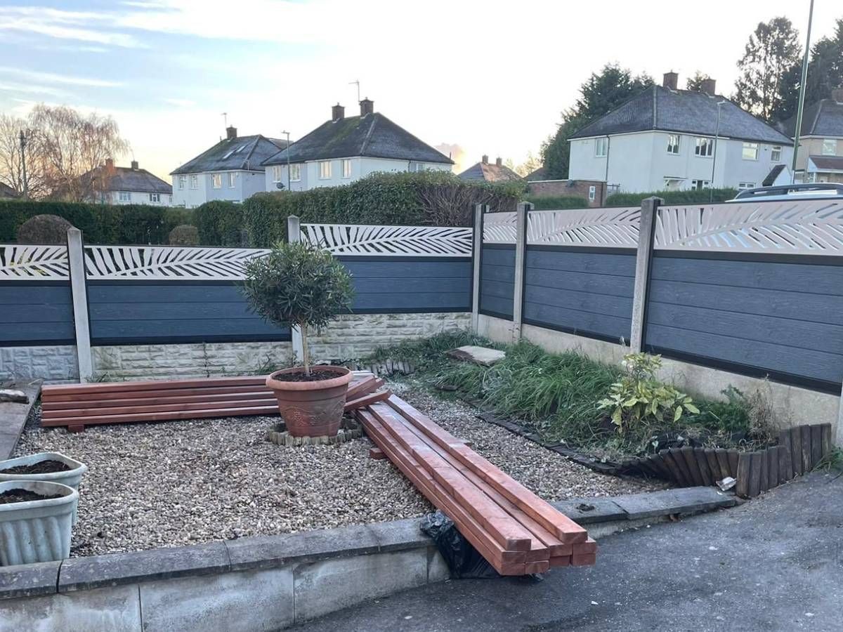Nottingham Fencing two fence sections of silver grey composite fencing with cream palm leaf screen trellis