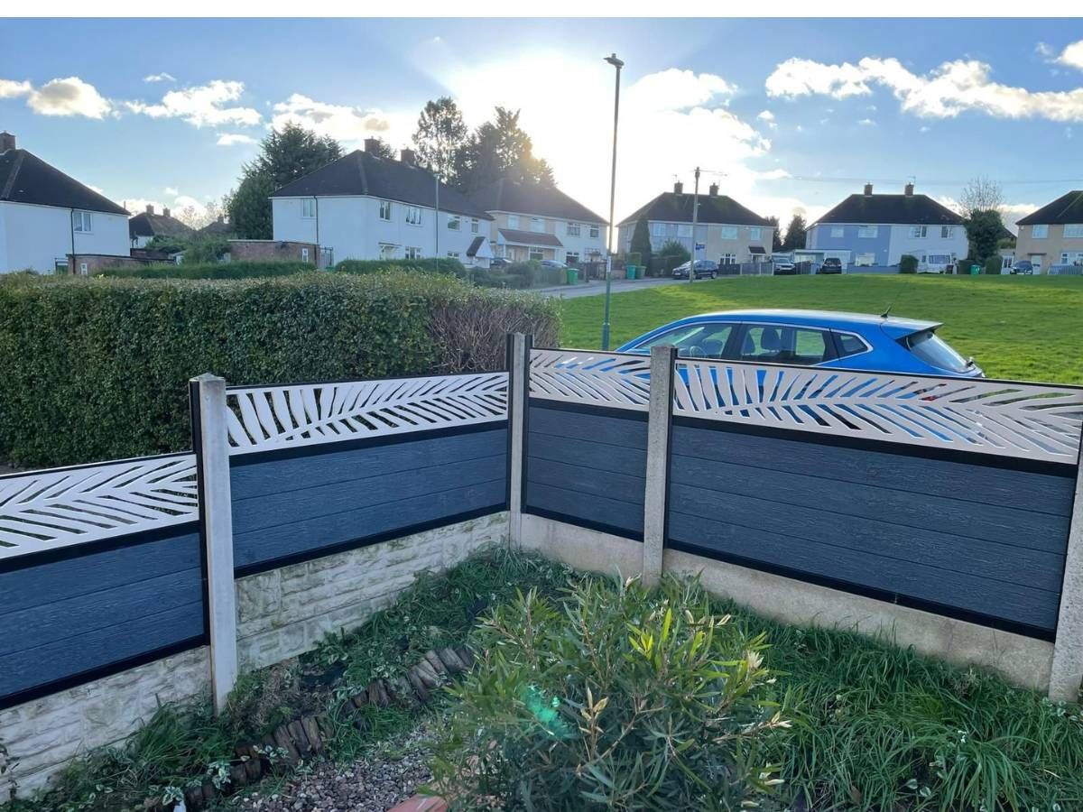 Nottingham Fencing silver grey composite fencing with cream palm leaf screen trellis