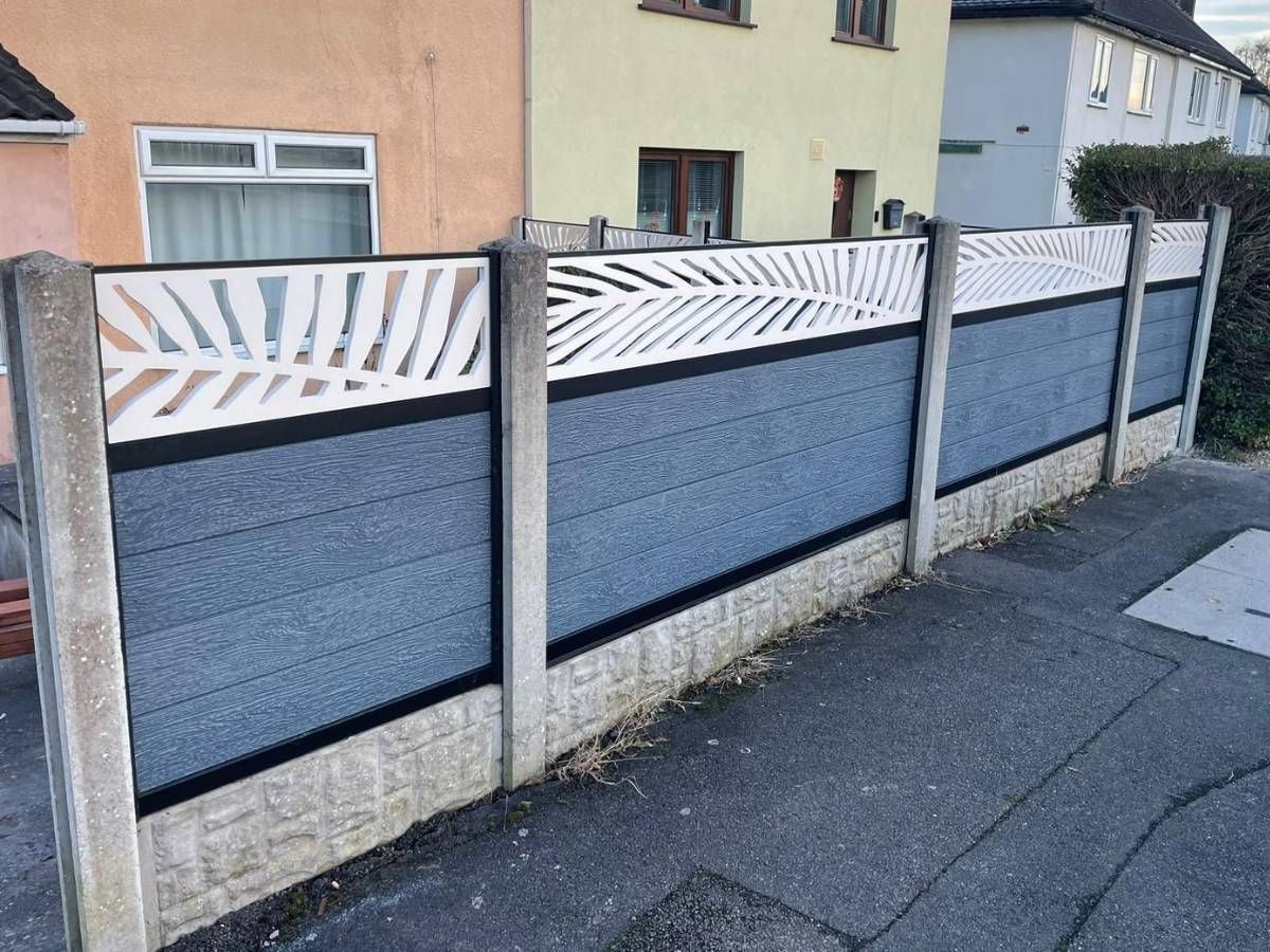 Nottingham Fencing silver grey composite fencing on rock faced gravel boards with cream palm leaf screen trellis in front garden