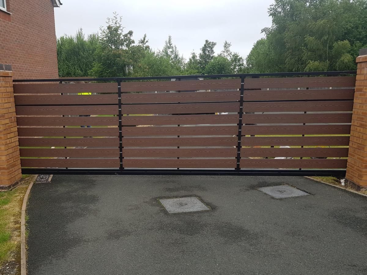 Slatted composite driveway gates in Nottingham