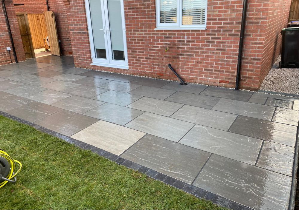 Nottingham Fencing grey Indian stone patio as part of landscaping