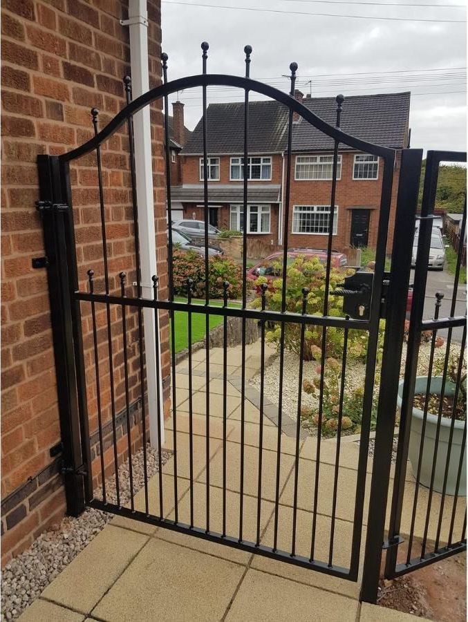 Nottingham Fencing close up of arched metal gate