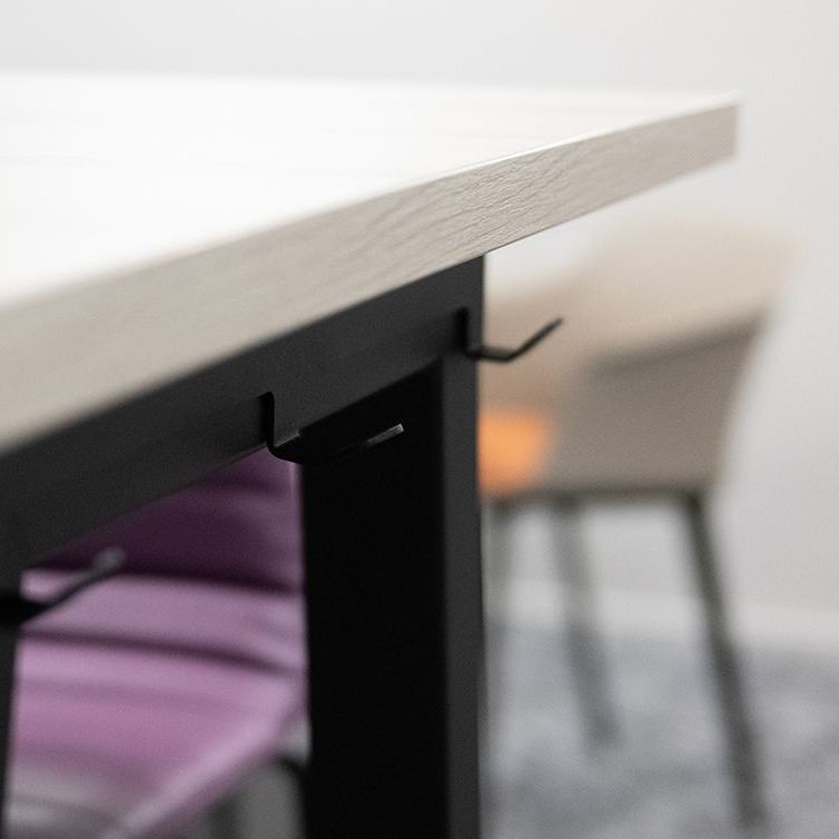 Close up photos of hanging hooks on the table, a great place for hanging bags and jackets.