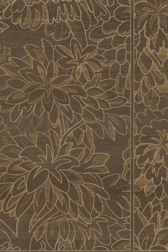 Brown and tan floral patterned carpet.