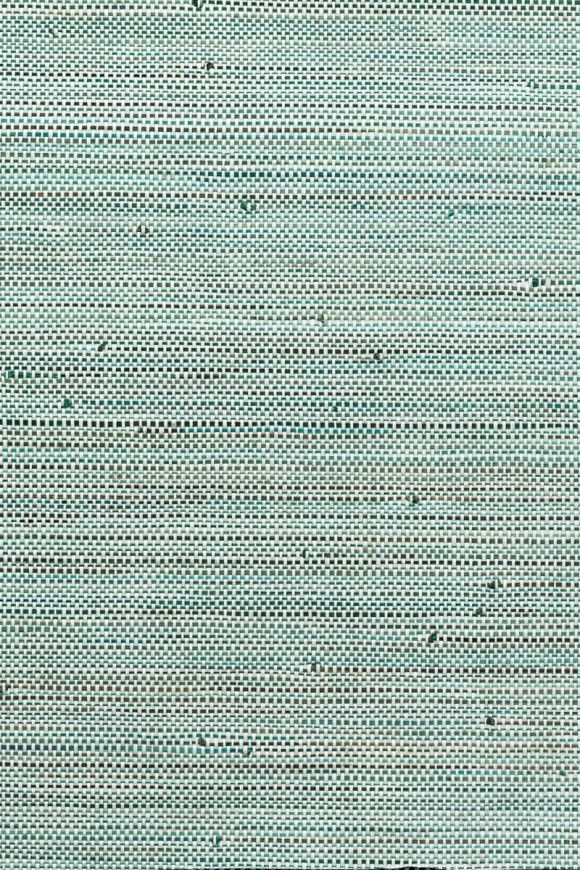 Textured teal woven fabric with visible horizontal and vertical threads.