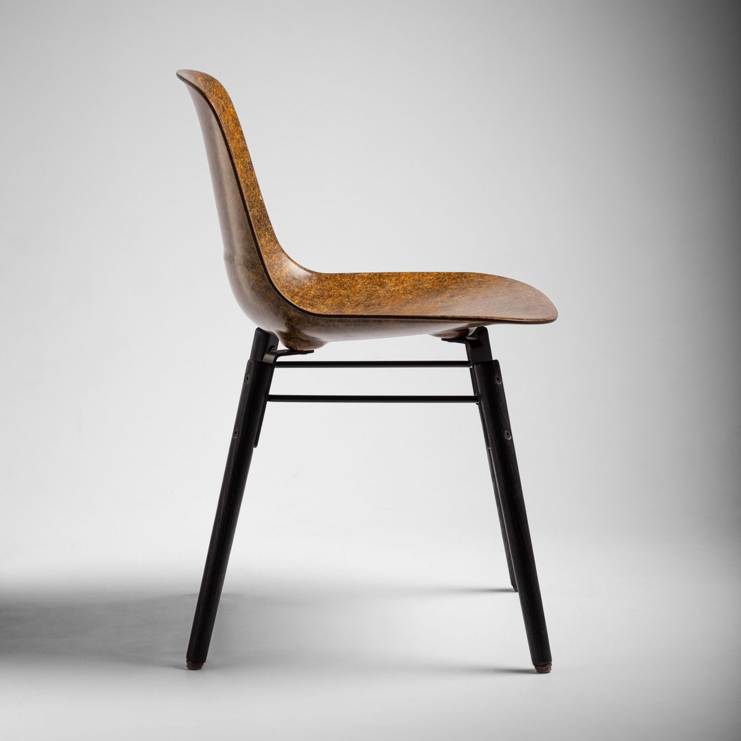 Ochre welsh mountain Solidwool sheet with scorched ash legs, Hembury chair facing right.