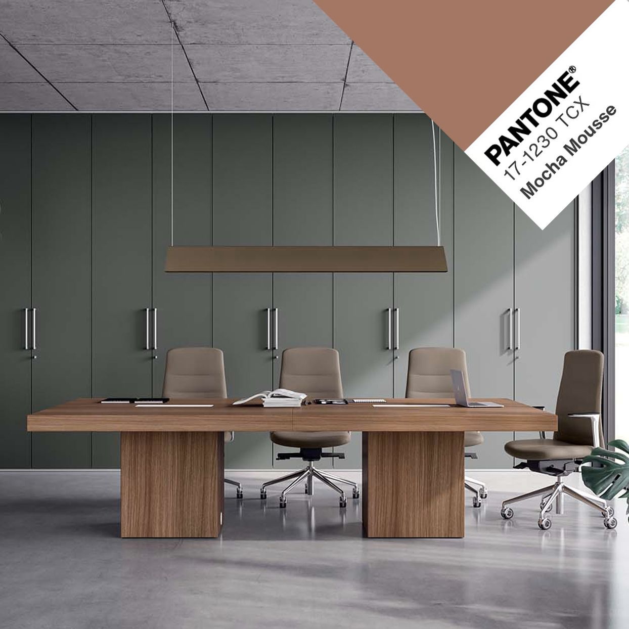 A pantone 17 2230 tcx mocha mouse color is being used in a meeting room