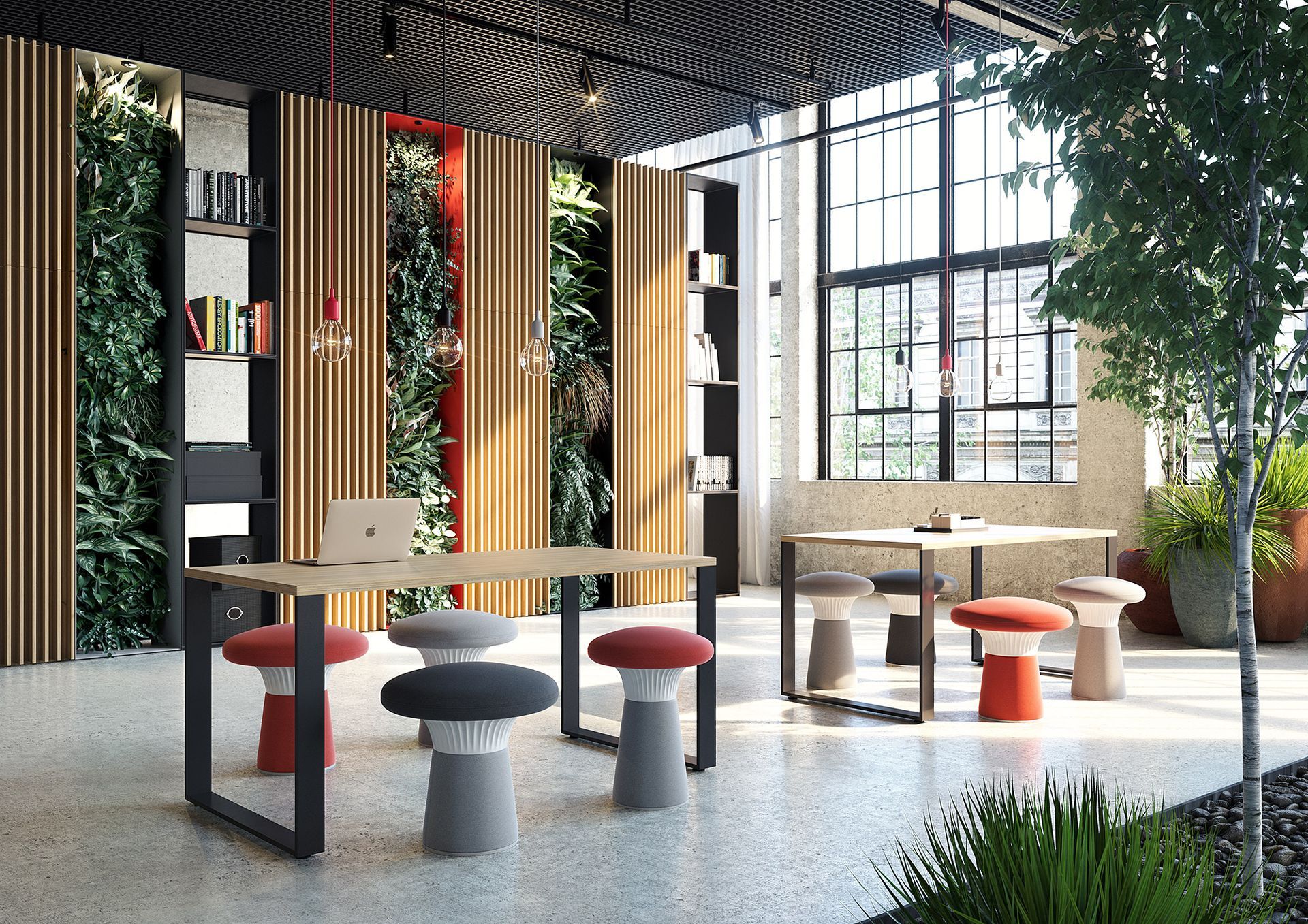 Modern office space with wooden tables, mushroom stools, and a green wall.