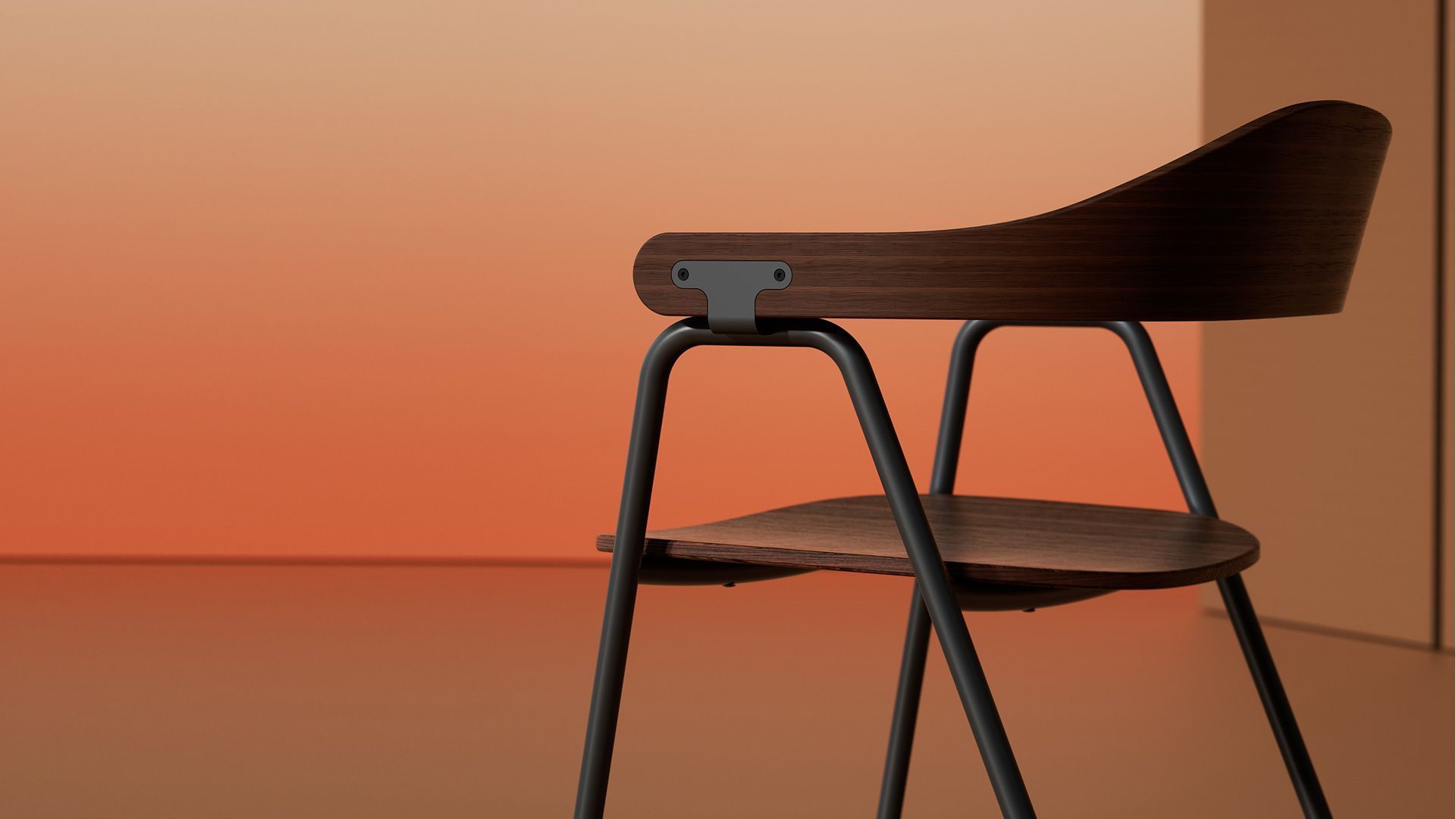 Wooden chair with curved back and metal legs in an orange-toned room.