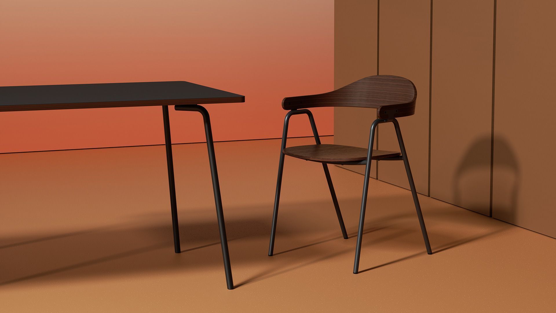 black and dark wood Otto chair and table situated in a warm orange studio