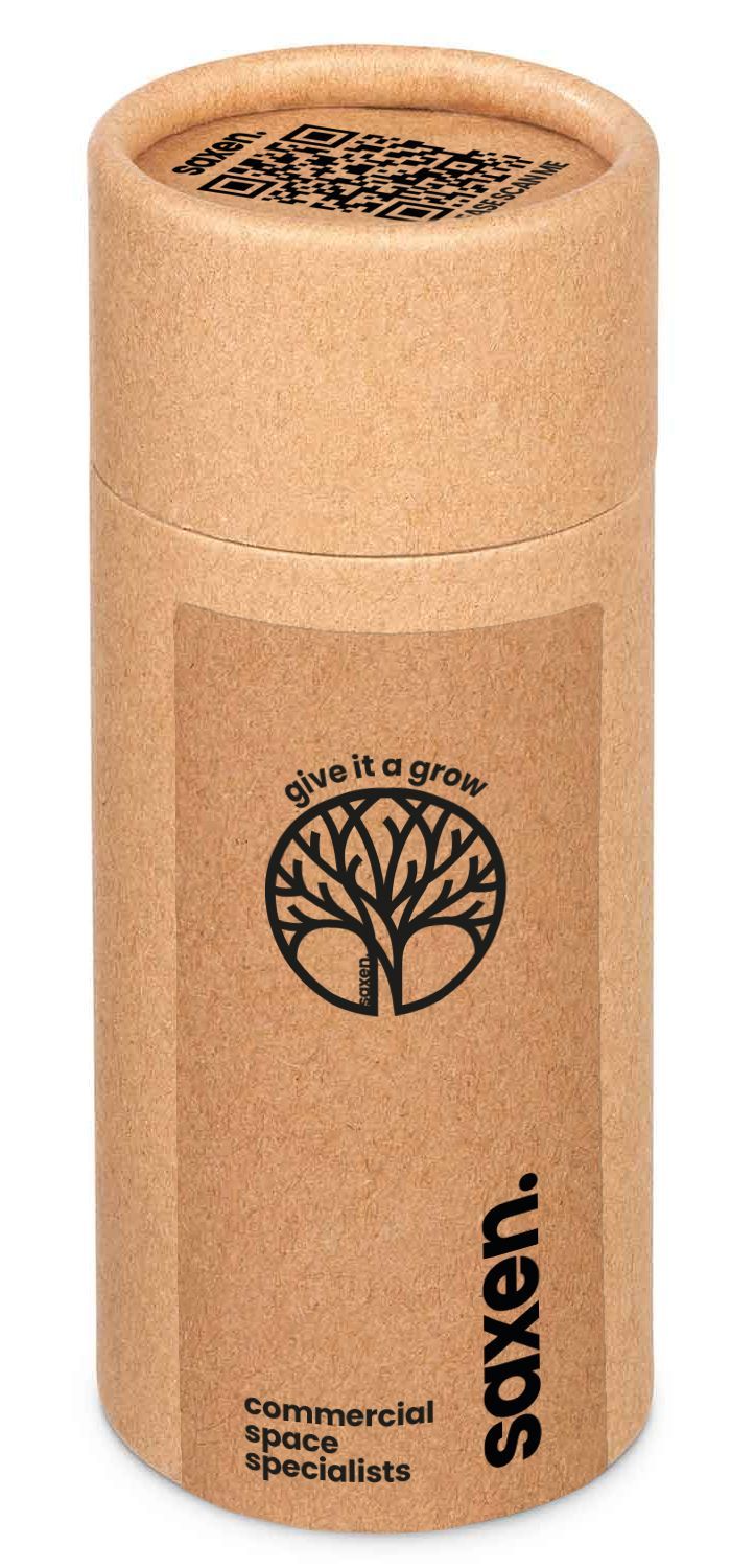 a brown tube branded with saxen's give it a grow initiative. inside is an acorn for growing yourself