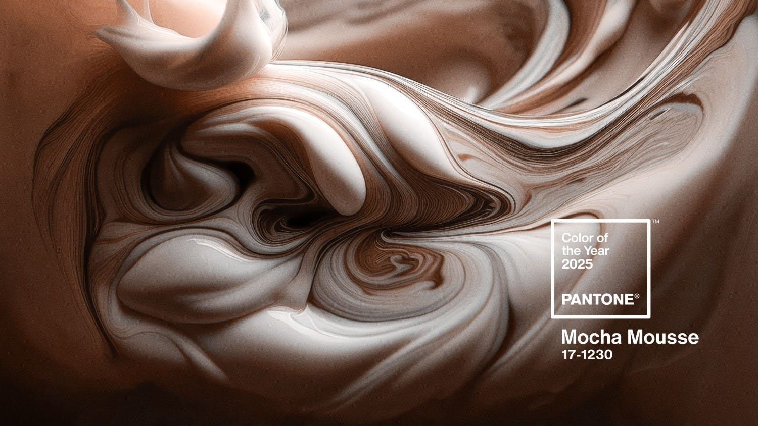 A close up of a swirl of mocha mousse.