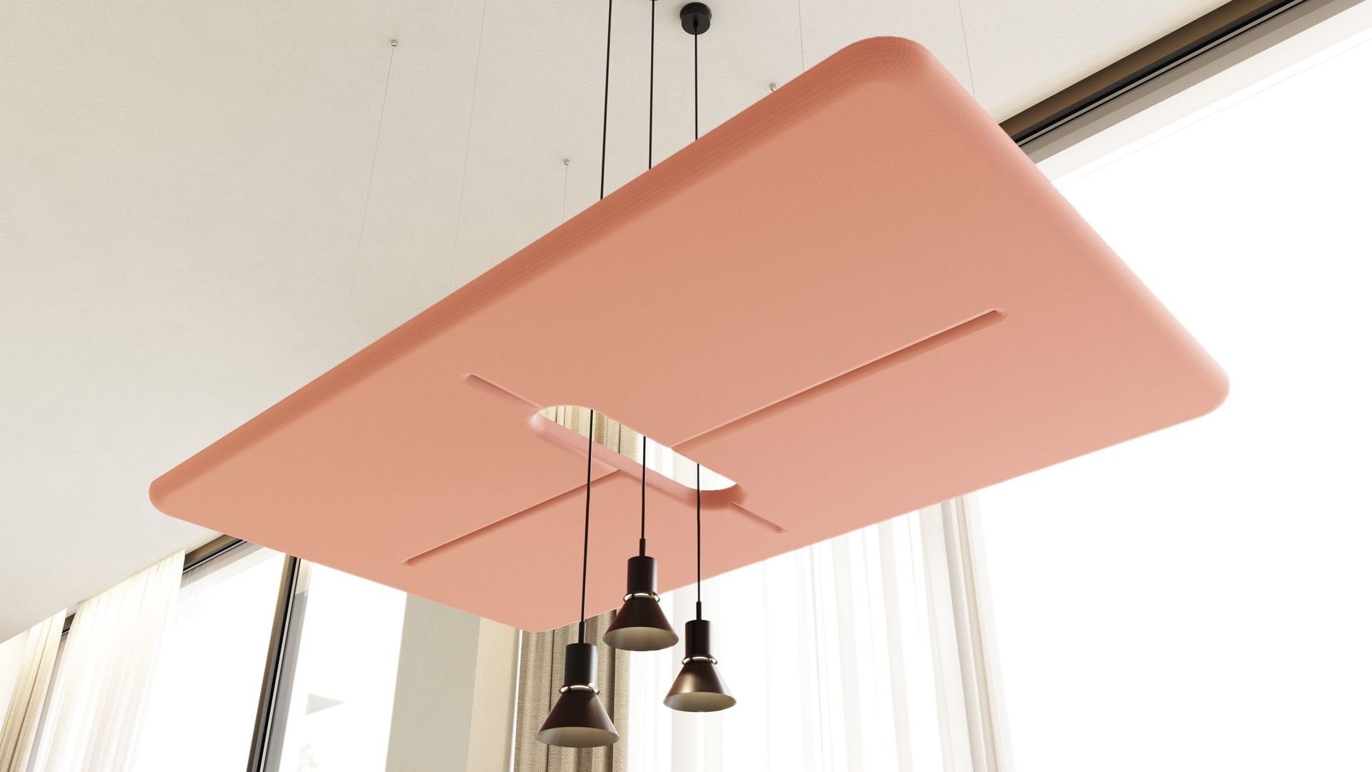 A peach acoustic ceiling hanging with three lights dangling through the middle gap. 