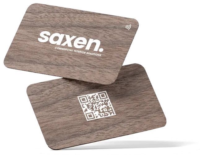 Two Saxen bamboo business cards, showing the front (with Saxen branding) and the back (a QR code)