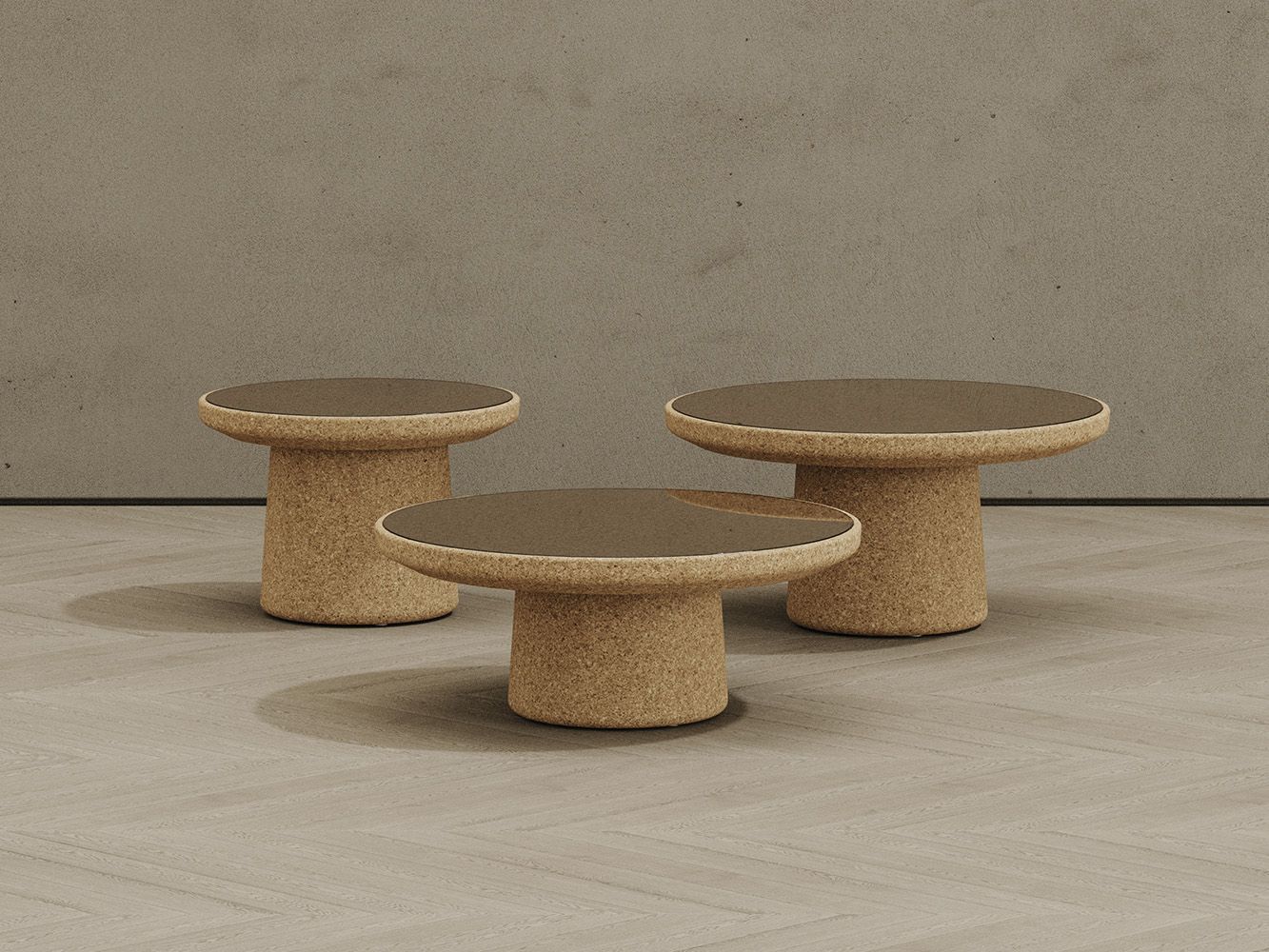 3 Tejo collection cork tables in a studio space with beige flooring and walls