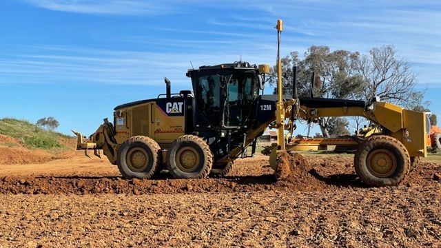 Yellow Grader On Open Area — Earthmoving In Upper Manilla, NSW