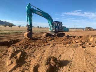 Excavator On A Construction Site — Earthmoving In Upper Manilla, NSW