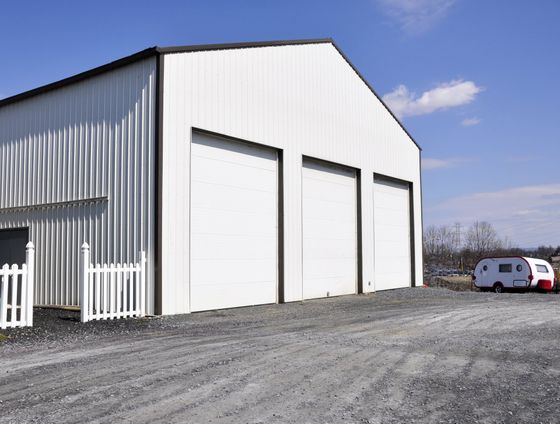 commercial building with three garage doors
