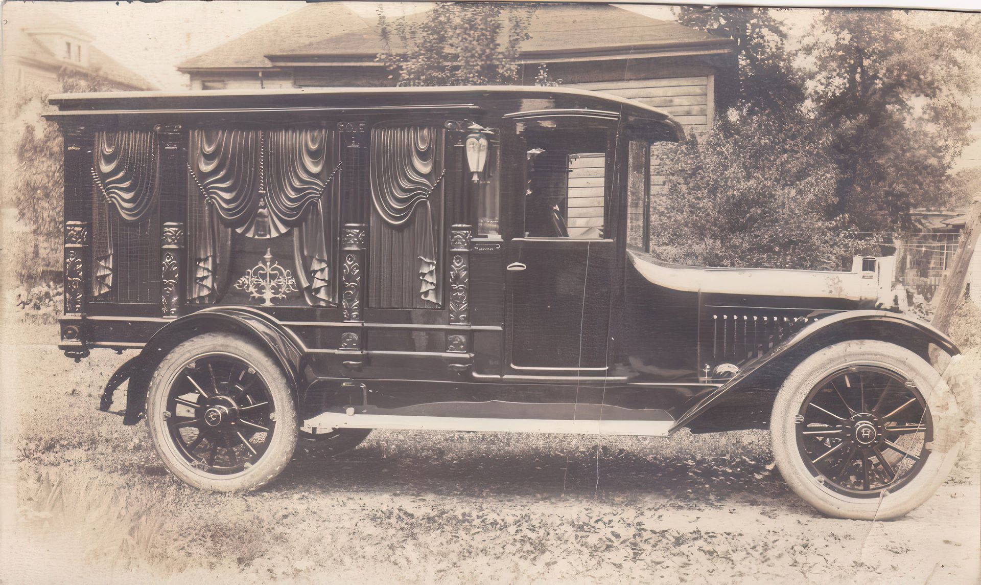 A black and white photo of an old car that says ' united states postal service ' on the side