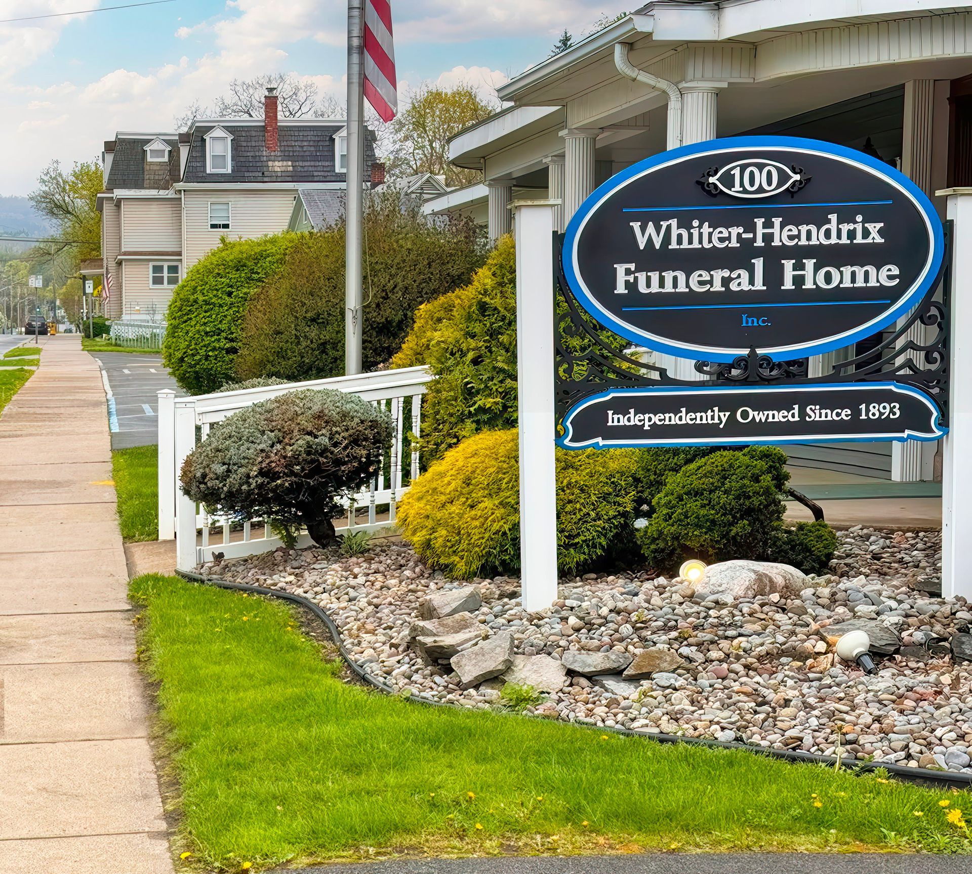 A sign for the whiter-hendrix funeral home