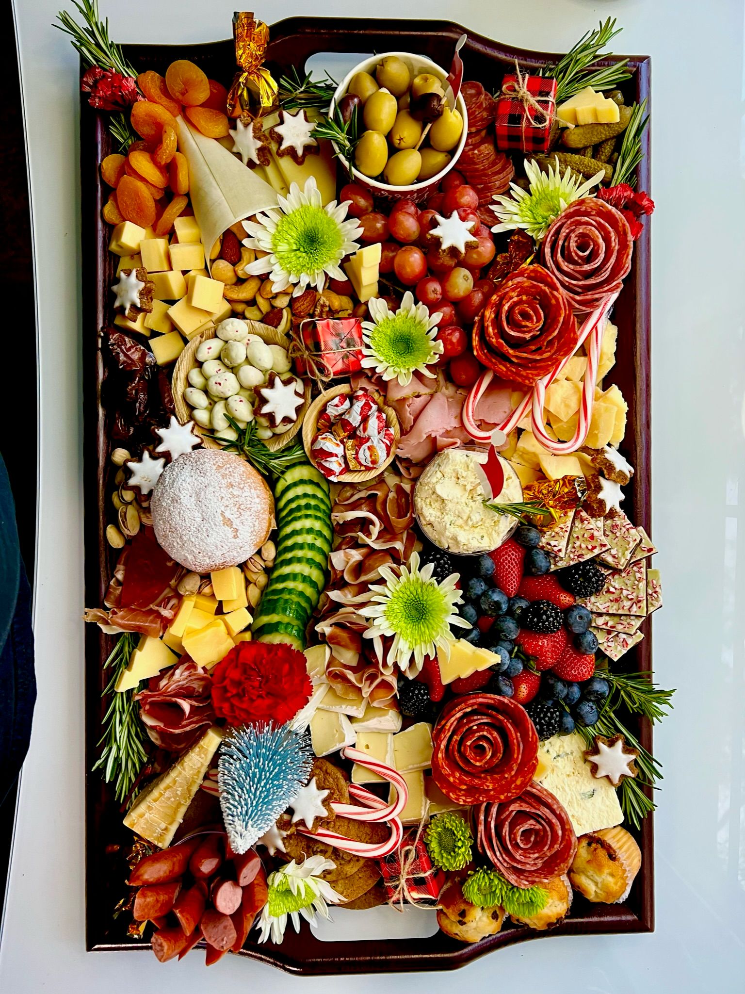 A large tray filled with lots of different types of food.