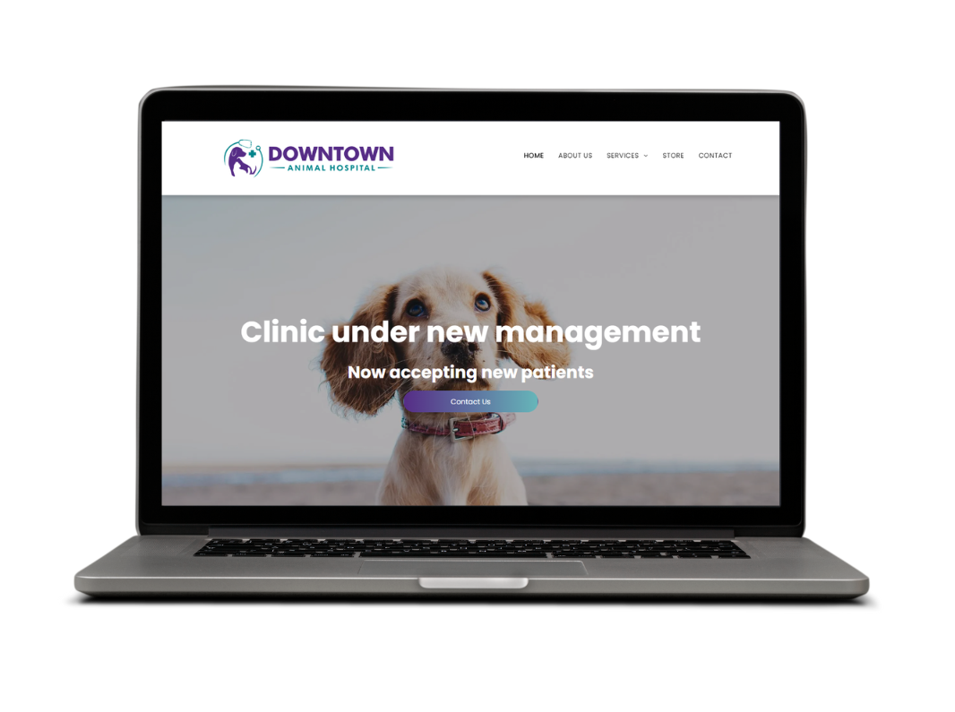 A laptop computer with a picture of a dog on the screen.