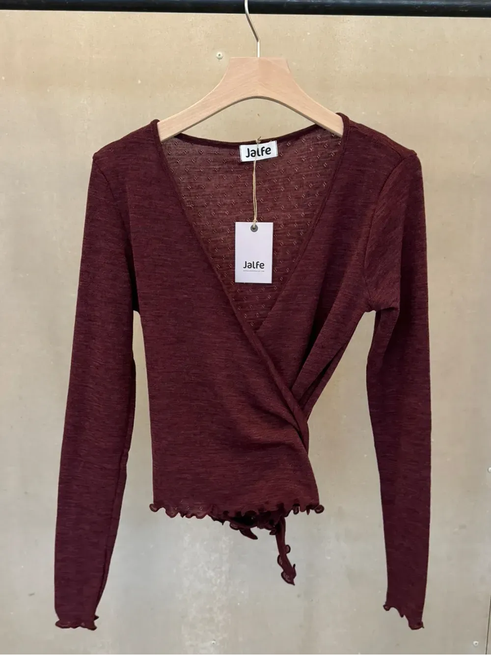 Wikkelvestje merino eyelet plum melange